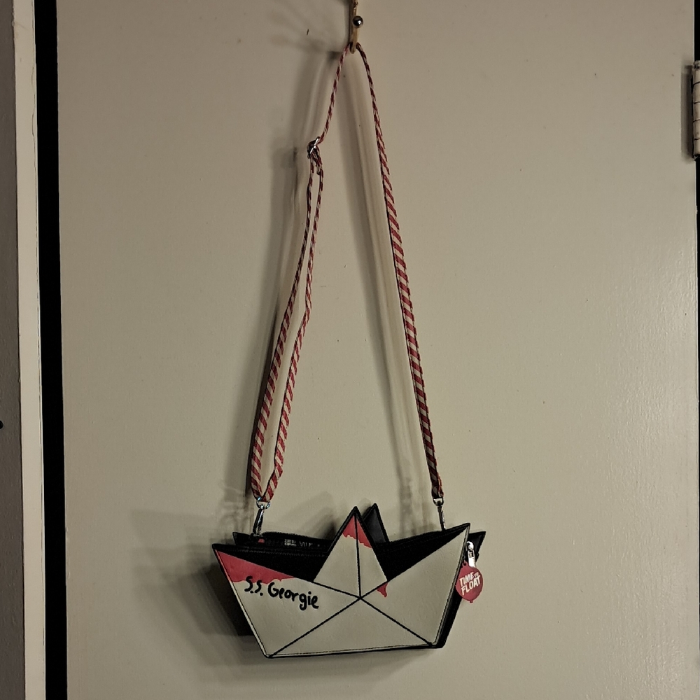 SS Georgie Boat-Shaped Bag with Red and Black Accents